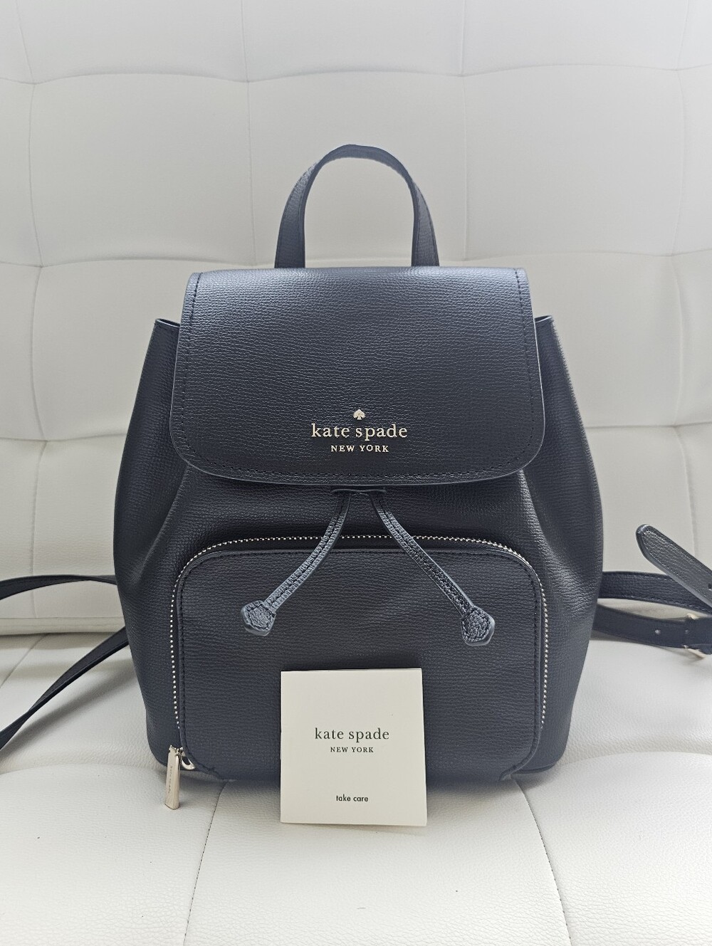 Authentic Kate spade Black Pebbled leather backpack with gold logo